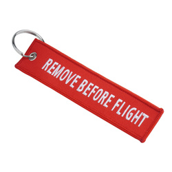 Fostex - Brelok do kluczy Remove Before Flight - Czerwony